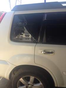 The getaway car with the bullet hole from where the police shot at them.