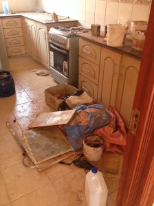 How the flooring guys had left the kitchen.